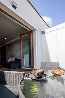 Glass House Hot Tub Apartments