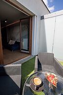 Glass House Hot Tub Apartments