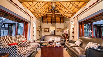 Ivory Wilderness River Rock Lodge