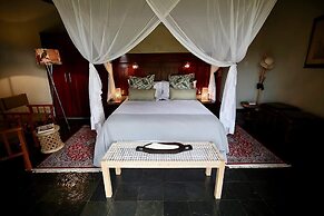 Ivory Wilderness River Rock Lodge