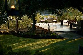 Ivory Wilderness River Rock Lodge