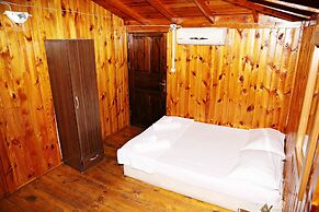 Olimpos Salinas Wooden Houses