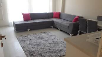 Ugur Suit