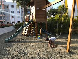 Tropical Condo BBQ Pool 5min to Airport