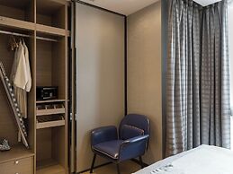 Pengman International Apartment Hotel