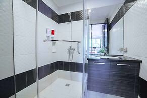 RedDoorz Plus @ Aguirre Avenue BF Homes