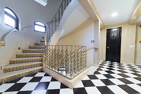 RedDoorz Plus @ Aguirre Avenue BF Homes