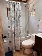 Cabañas entre montañas con tinajas calientes