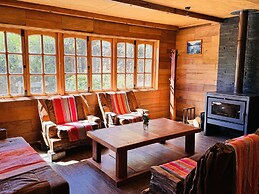 Cabañas entre montañas con tinajas calientes