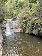 Cabañas entre montañas con tinajas calientes