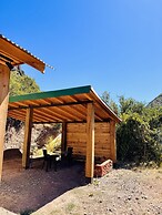 Cabañas entre montañas con tinajas calientes