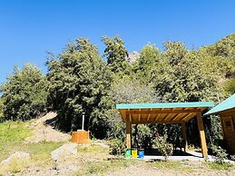 Cabañas entre montañas con tinajas calientes