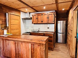 Cabañas entre montañas con tinajas calientes