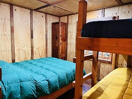 Cabañas entre montañas con tinajas calientes