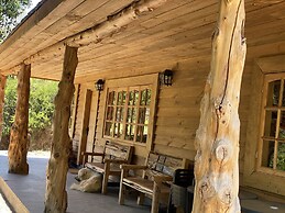 Cabañas entre montañas con tinajas calientes