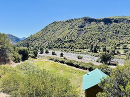 Cabañas entre montañas con tinajas calientes