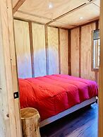 Cabañas entre montañas con tinajas calientes