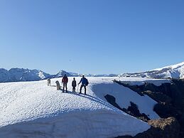 Cabañas entre montañas con tinajas calientes