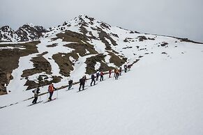 Cabañas entre montañas con tinajas calientes