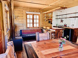 Cabañas entre montañas con tinajas calientes