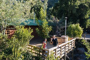 Cabañas entre montañas con tinajas calientes