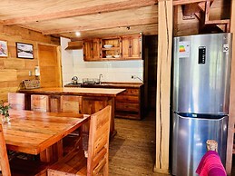 Cabañas entre montañas con tinajas calientes