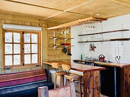 Cabañas entre montañas con tinajas calientes