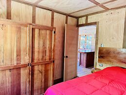 Cabañas entre montañas con tinajas calientes