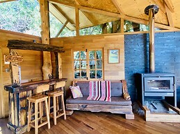 Cabañas entre montañas con tinajas calientes