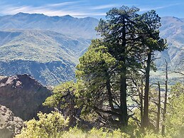 Cabañas entre montañas con tinajas calientes