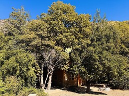 Cabañas entre montañas con tinajas calientes