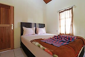 Tuk Tuk Timbul Bungalows