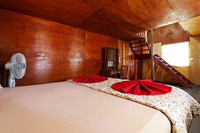 Tuk Tuk Timbul Bungalows