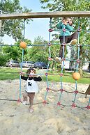 Camping Le Petit Lion - Lodges Bois