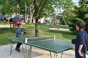 Camping Le Petit Lion - Lodges Bois
