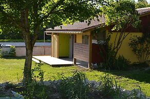 Camping Le Petit Lion - Lodges Bois