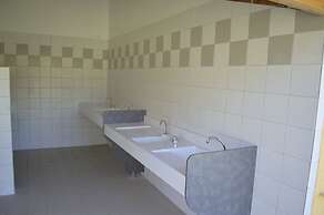 Camping Le Petit Lion - Lodges Bois