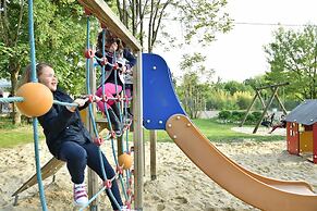 Camping Le Petit Lion - Lodges Bois