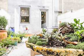 Modern European Home - Garden Patio w/ Firepit