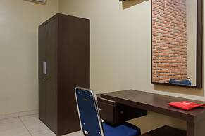 RedDoorz Plus near Pantai Malalayang Manado