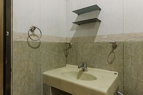 RedDoorz Plus near Pantai Malalayang Manado