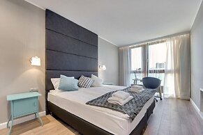 Aura by Downtown Apartments