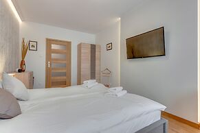 Aura by Downtown Apartments