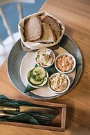 Aura by Downtown Apartments