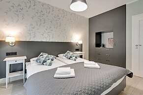 Aura by Downtown Apartments