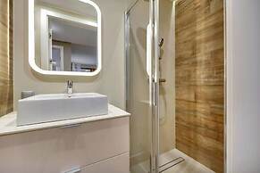 Aura by Downtown Apartments