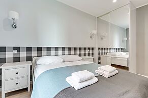 Aura by Downtown Apartments