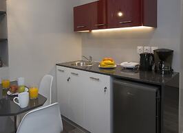 Homelike Studios in the Heart of the City by GHH