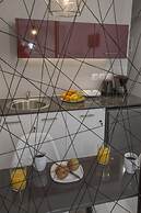 Homelike Studios in the Heart of the City by GHH