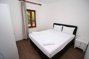 Gumusluk Tramonto Evleri